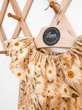 Neutral Floral Baby Romper: Ruffle Neckline Cotton