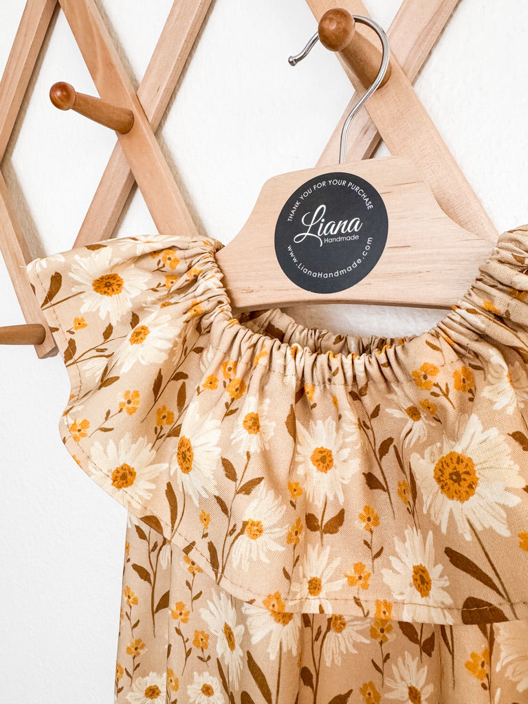 Neutral Floral Baby Romper: Ruffle Neckline Cotton