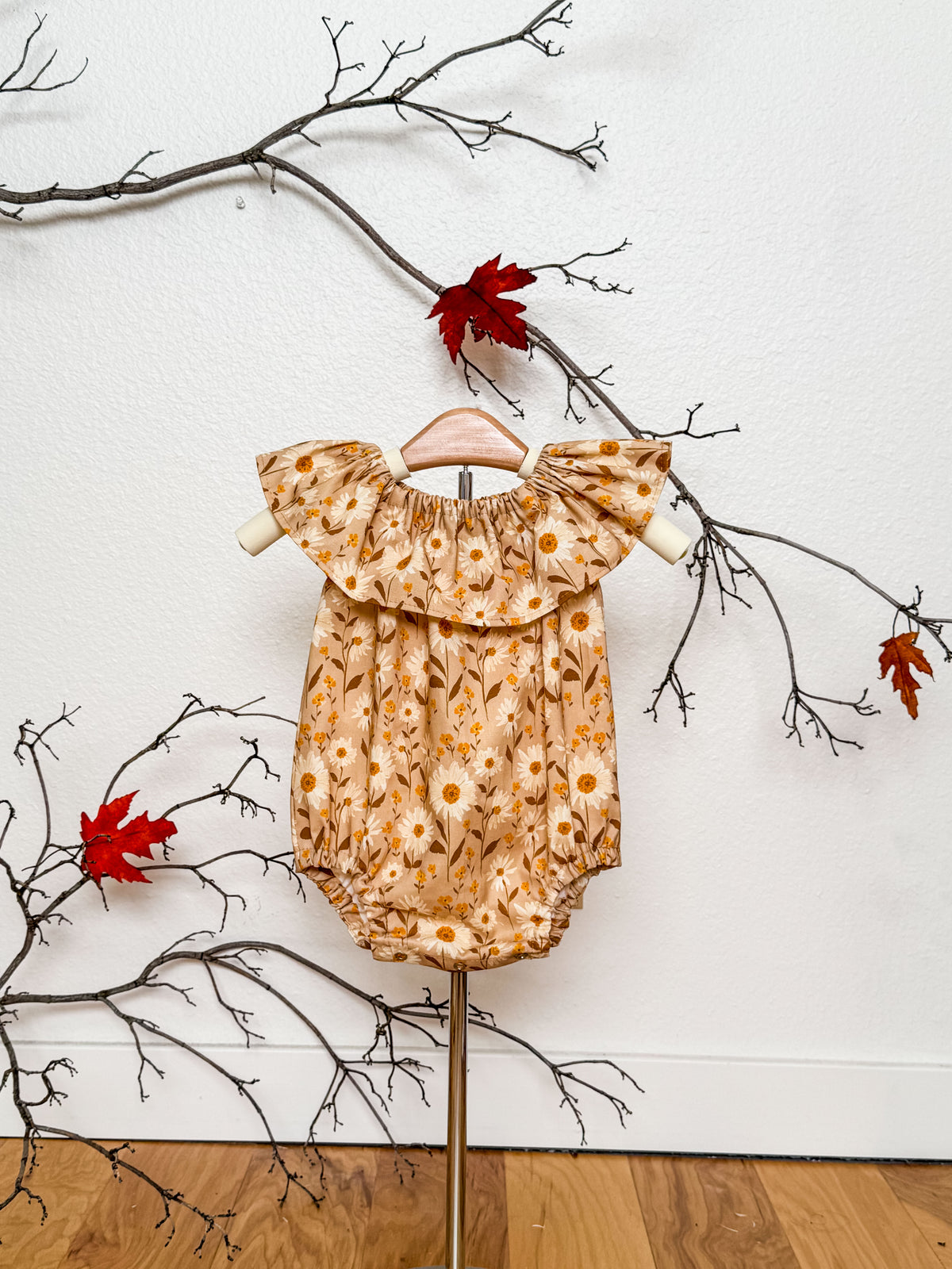 Neutral Floral Baby Romper: Ruffle Neckline Cotton